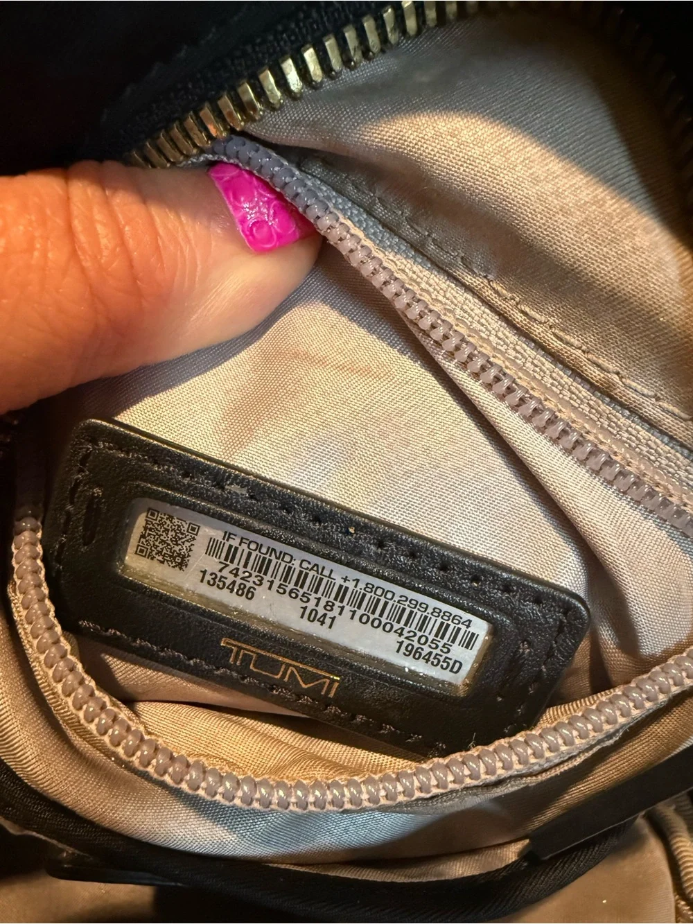 Tumi Black Sling Belt Bag with Gold Hardware